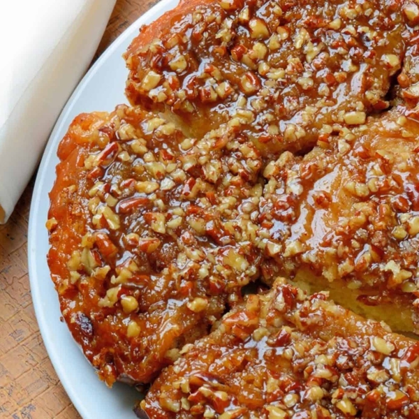 Pecan Sticky Buns are the best hot sticky bun recipe out there, made just the way grandma on the farm made them with a caramel pecan sauce. #stickybuns #stickybunrecipe www.savoryexperiments.com