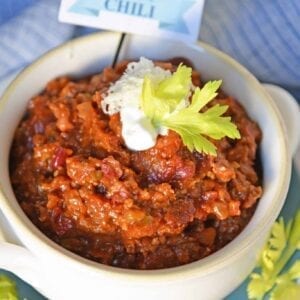 Blue Ribbon Award Winning Chili is, you guessed it, a chili cook-off winning recipe! A robust and rich stew loaded with beef, sausage, bacon and tons of vegetables. The best chili recipe ever! #awardwinningchili #bestchilirecipe www.savoryexperiments.com