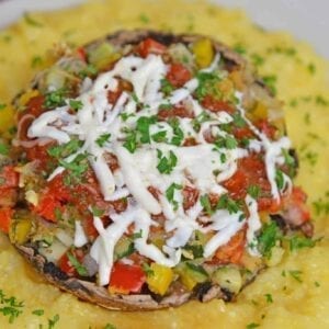 One of the best easy vegetarian recipes are Stuffed Portabella Mushrooms. A great vegetarian dinner idea perfect for meatless Monday! #stuffedmushrooms #vegetarianrecipes www.savoryexperiments.com