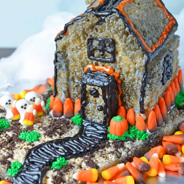 rice krispie treat haunted house surrounded by candy corn