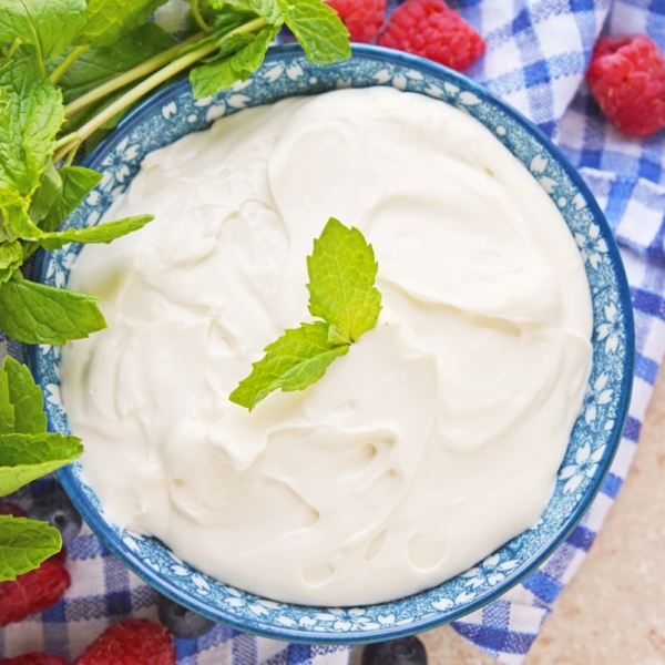 overhead of cream cheese fruit dip in blue bowl