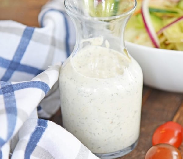 close up of salad dressings in a glass jar