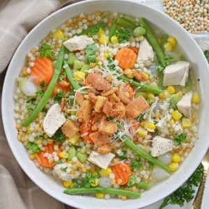 overhead bowl of turkey noodle soup with veggie