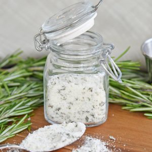 close up of a jar of rosemary salt