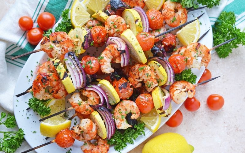 overhead shot of tray of garlic shrimp kabobs