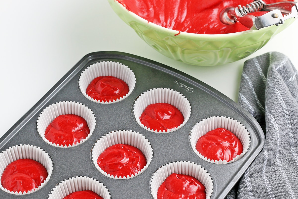 red velvet batter in a muffin tin