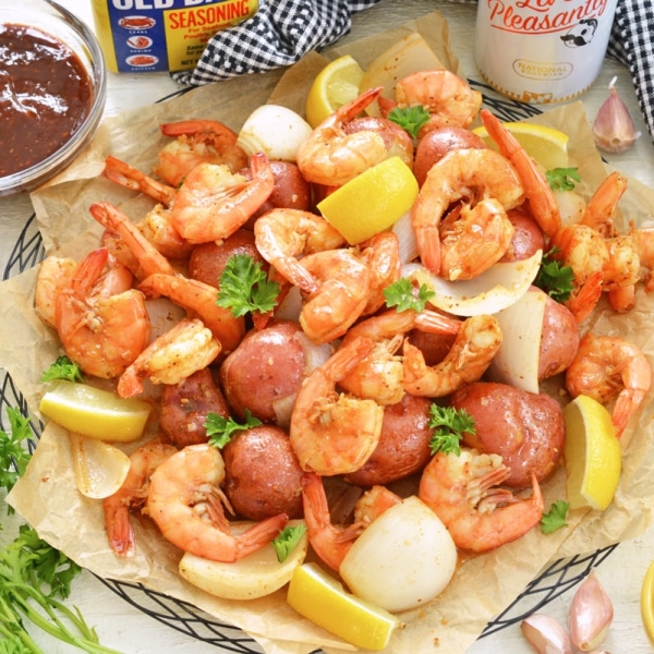 platter of steamed shrimp with beer and old bay