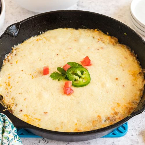 Queso fundido (Mexican cheese fondue) with hot potato skins