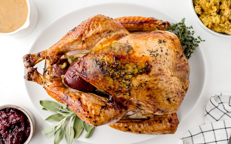 overhead shot of roasted turkey on a platter