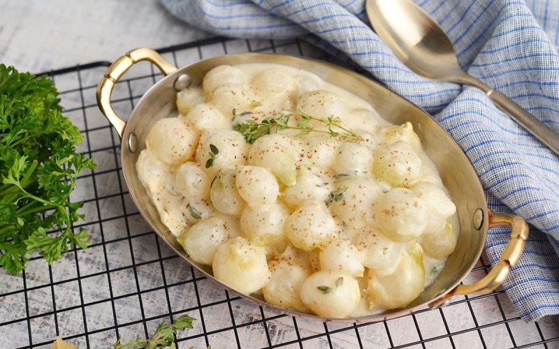 angled shot of creamed onions