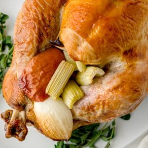 close up of a cooked turkey with apple, celery and onion stuffing