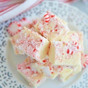 stack of easy peppermint fudge on a white plate