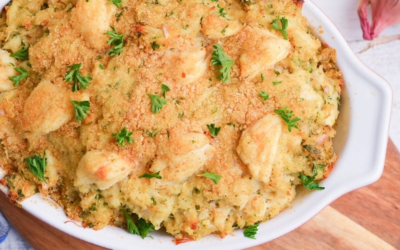 close up bread crumb topping and crab pieces on crab imperial