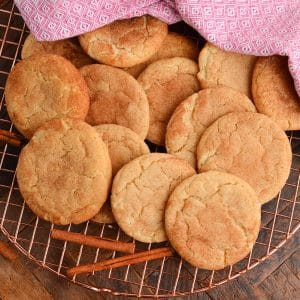 overhead shot of pile of snickerdoodle cookies on cooling rack