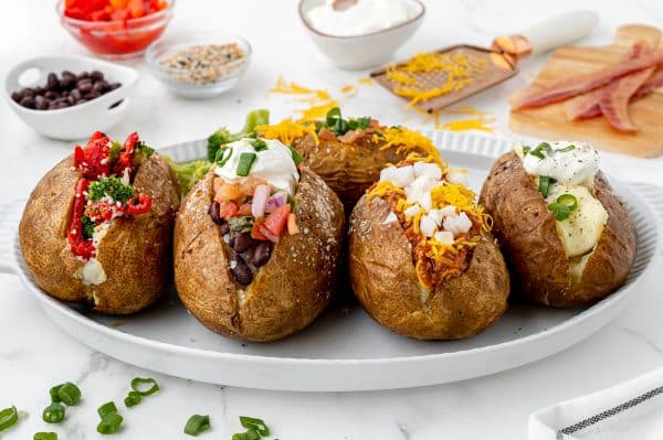 EASY Baked Potatoes in Oven (Crispy Skin & Fluffy Potatoes!)