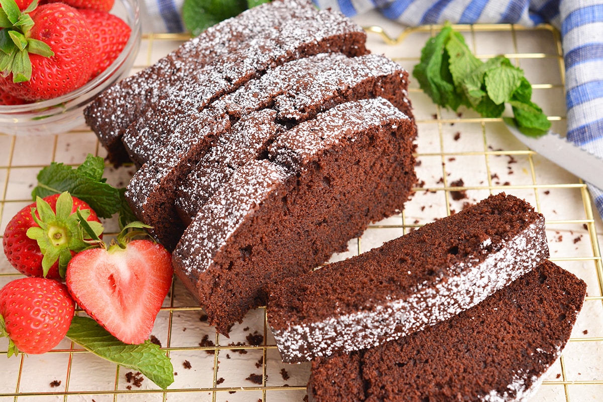Dark Chocolate Pound Cake with Strawberries and Cream •