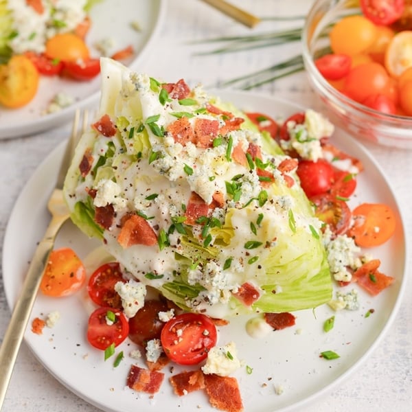 shot of toppings on wedge salad