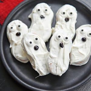 ghost Cookies on a black plate