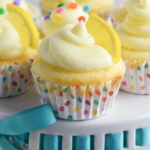 close up of a lemon cupcake in a confetti cupcake liner