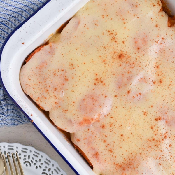 close up over head shot of tiktok cinnamon rolls in baking dish