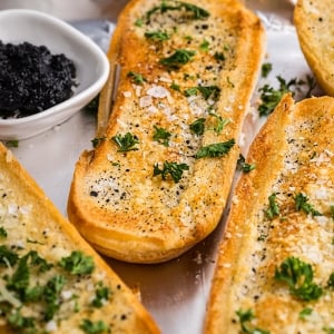 angled shot of loaves of truffle garlic bread