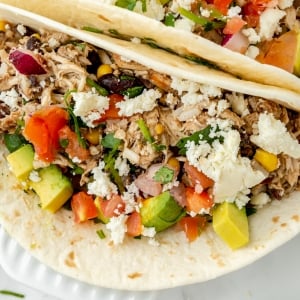 angled shot of slow cooker chicken tacos