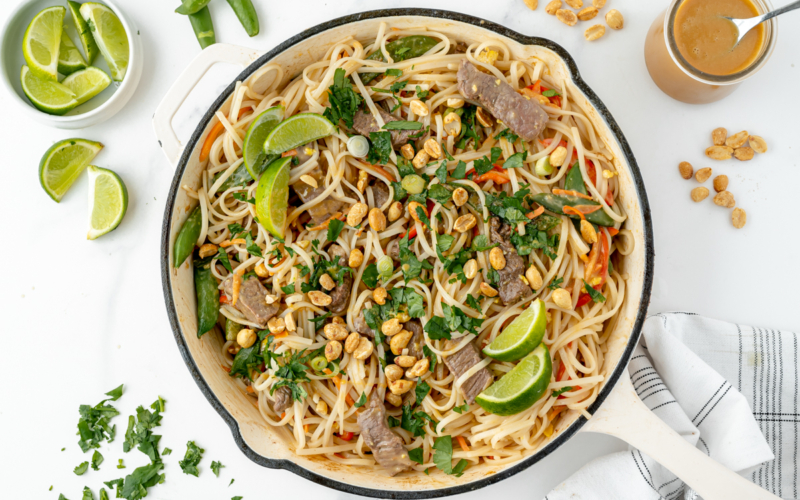 overhead shot of pan of beef pad thai