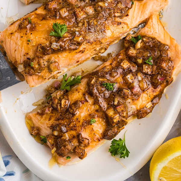 overhead shot of spatula picking up hot honey salmon