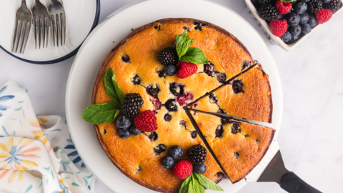 overhead shot of sliced berry ricotta cheesecake