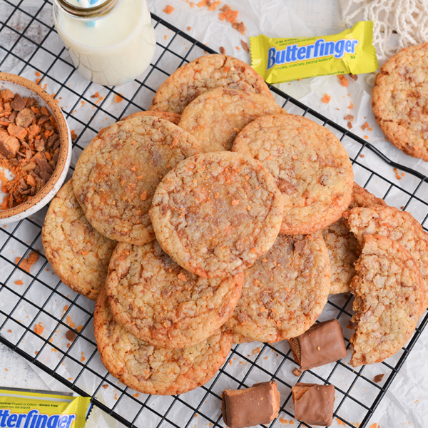 overhead shot of piled of butterfinger cookies on cooling rack