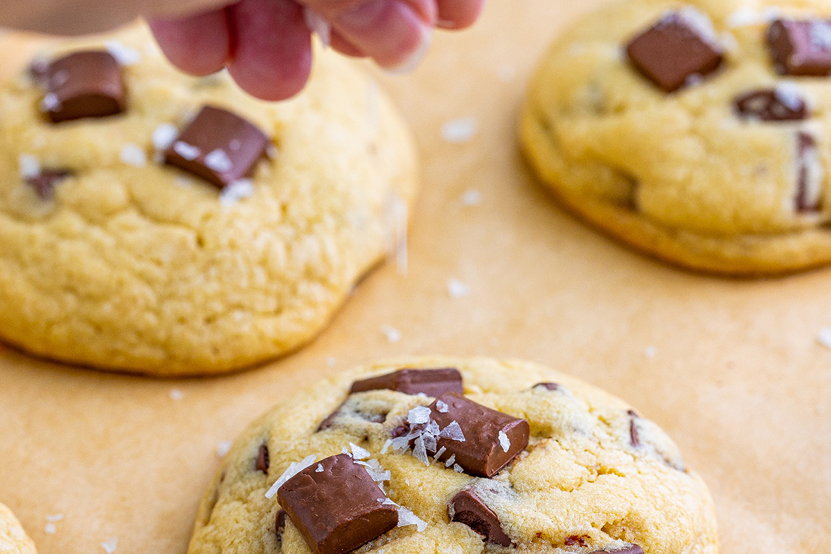 salt sprinkling onto chocolate chunk cookies