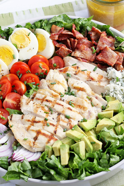 cobb salad on a green placemat