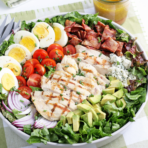 cobb salad on a green placemat