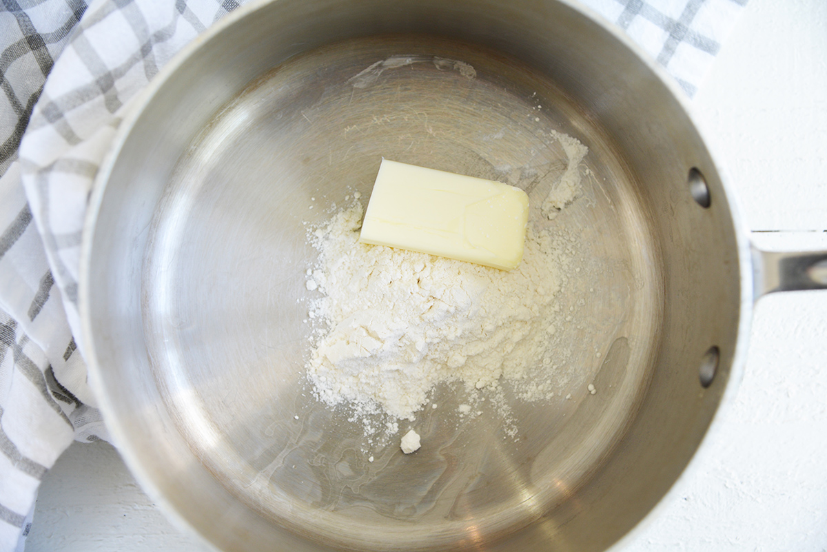 butter and flour in pan