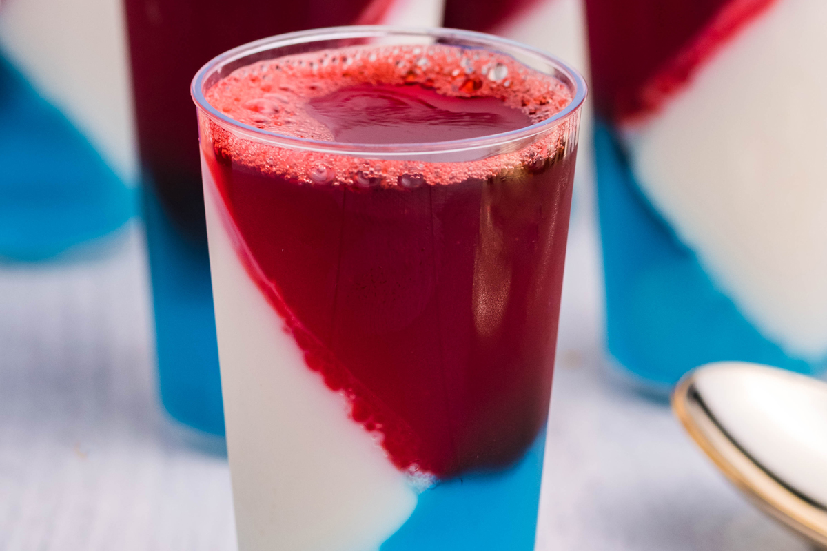 close up of red white and blue jello shots