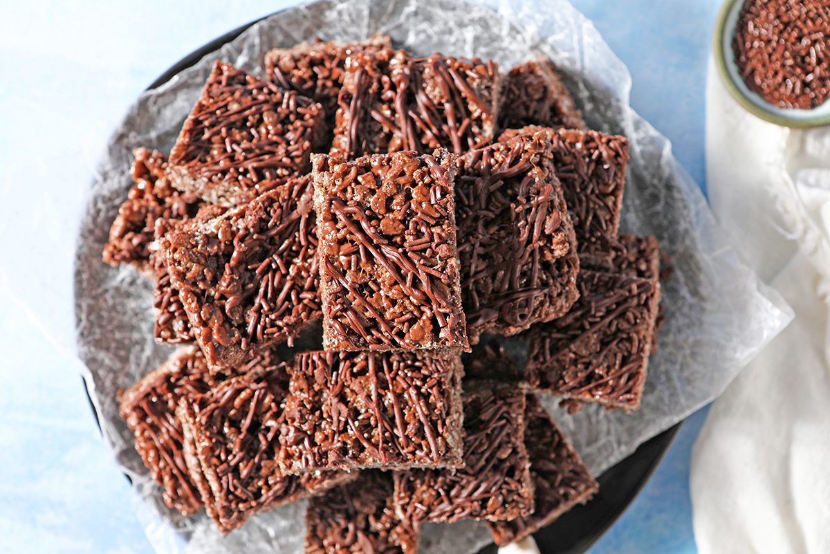 overhead serving platter of chocolate rice krispie treats cut into squares