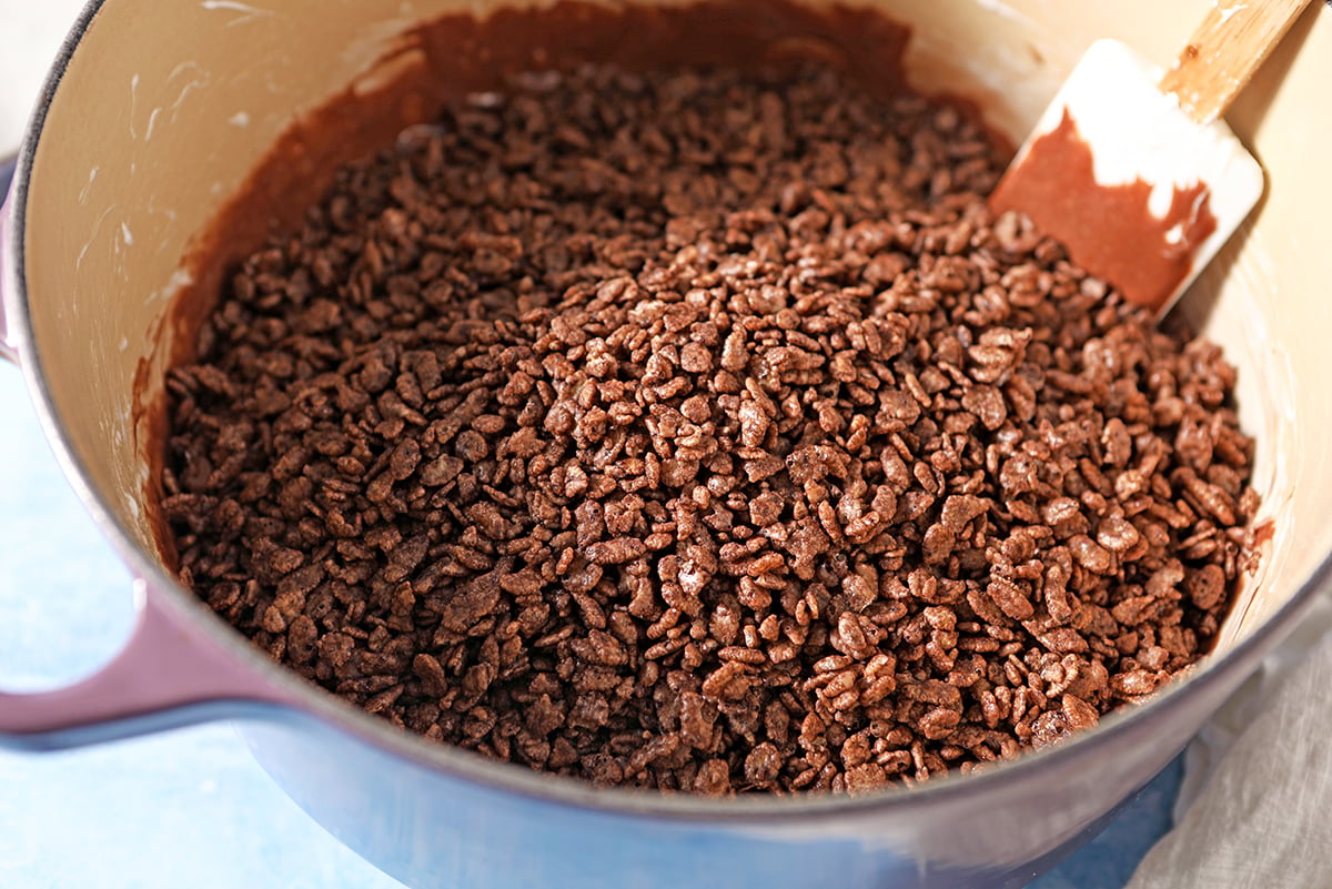 mixing bowl with cocoa krispie cereal and chocolate marshmallows