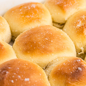 close up angled shot of pan of easy dinner rolls