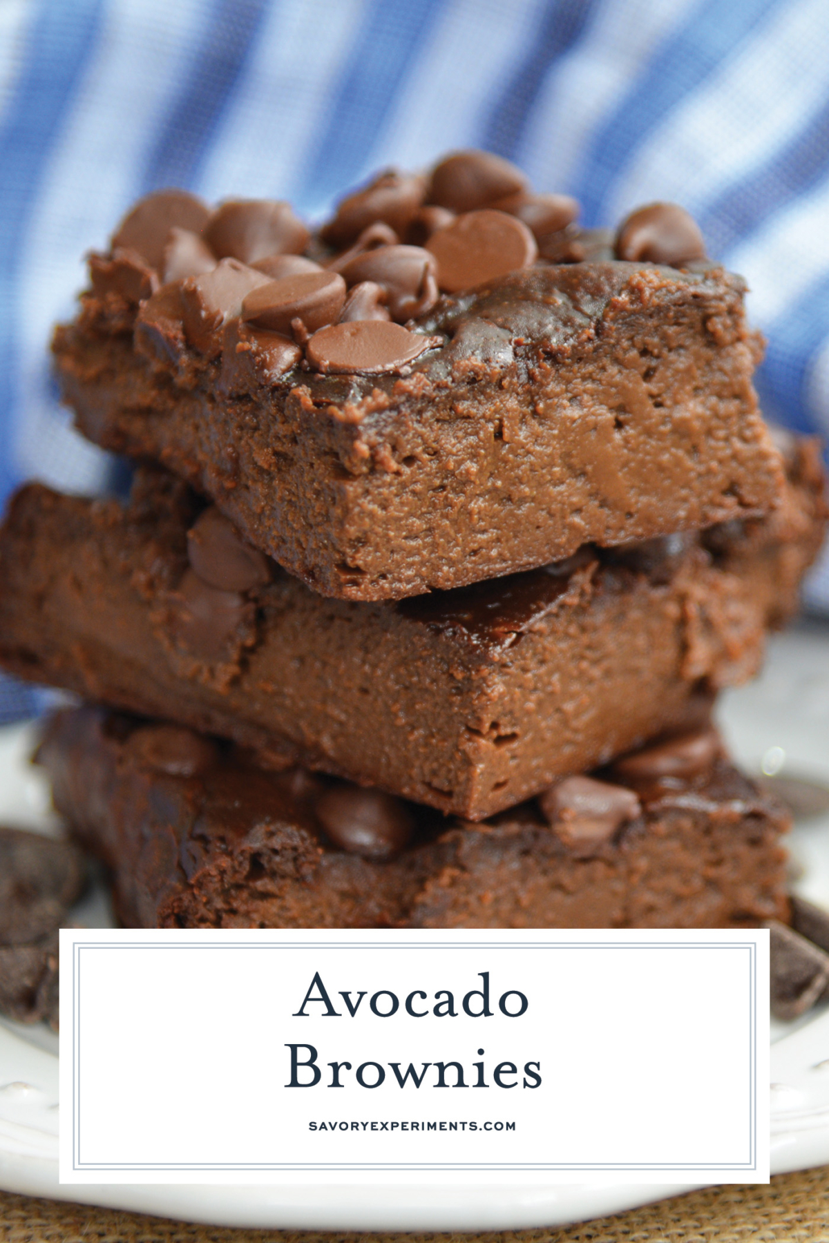 Close up of flourless avocado brownies with text overlay for pinterest