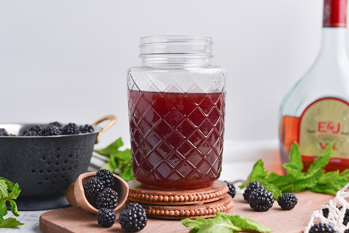 straight on shot of jar of blackberry brandy