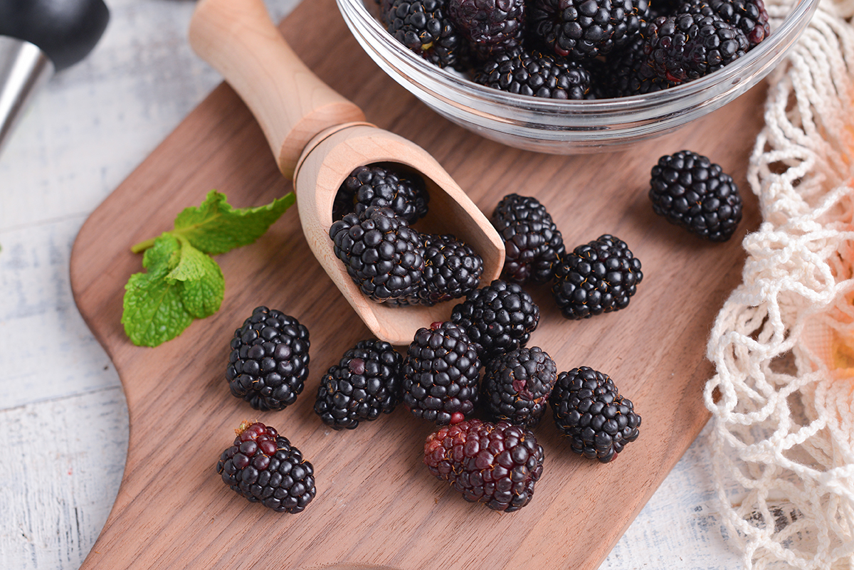 blackberries on cutting board