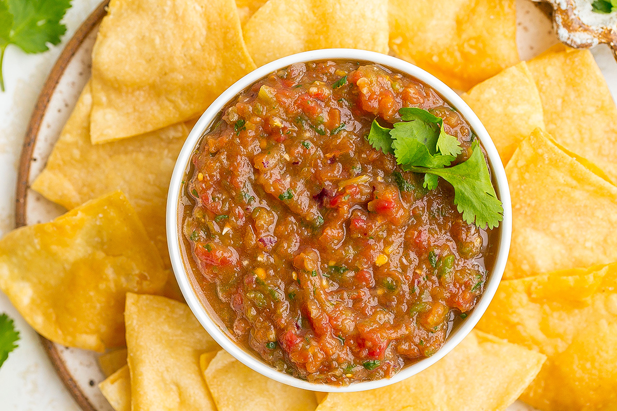 overhead shot of chips and blender salsa