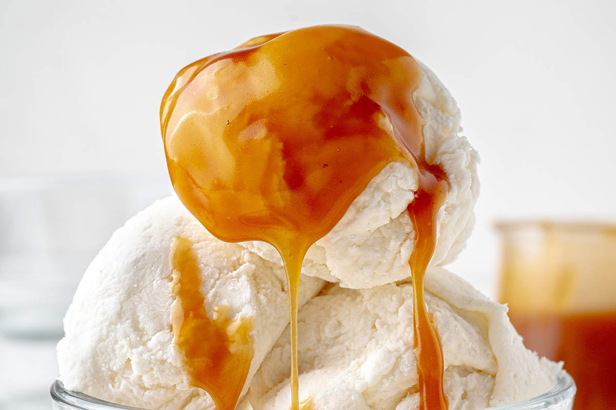salted caramel sauce dripping off of ice cream