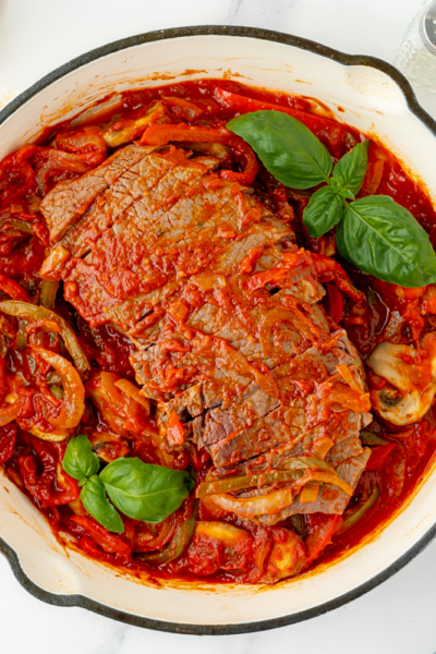 overhead shot of pan of carne alla pizzaiola