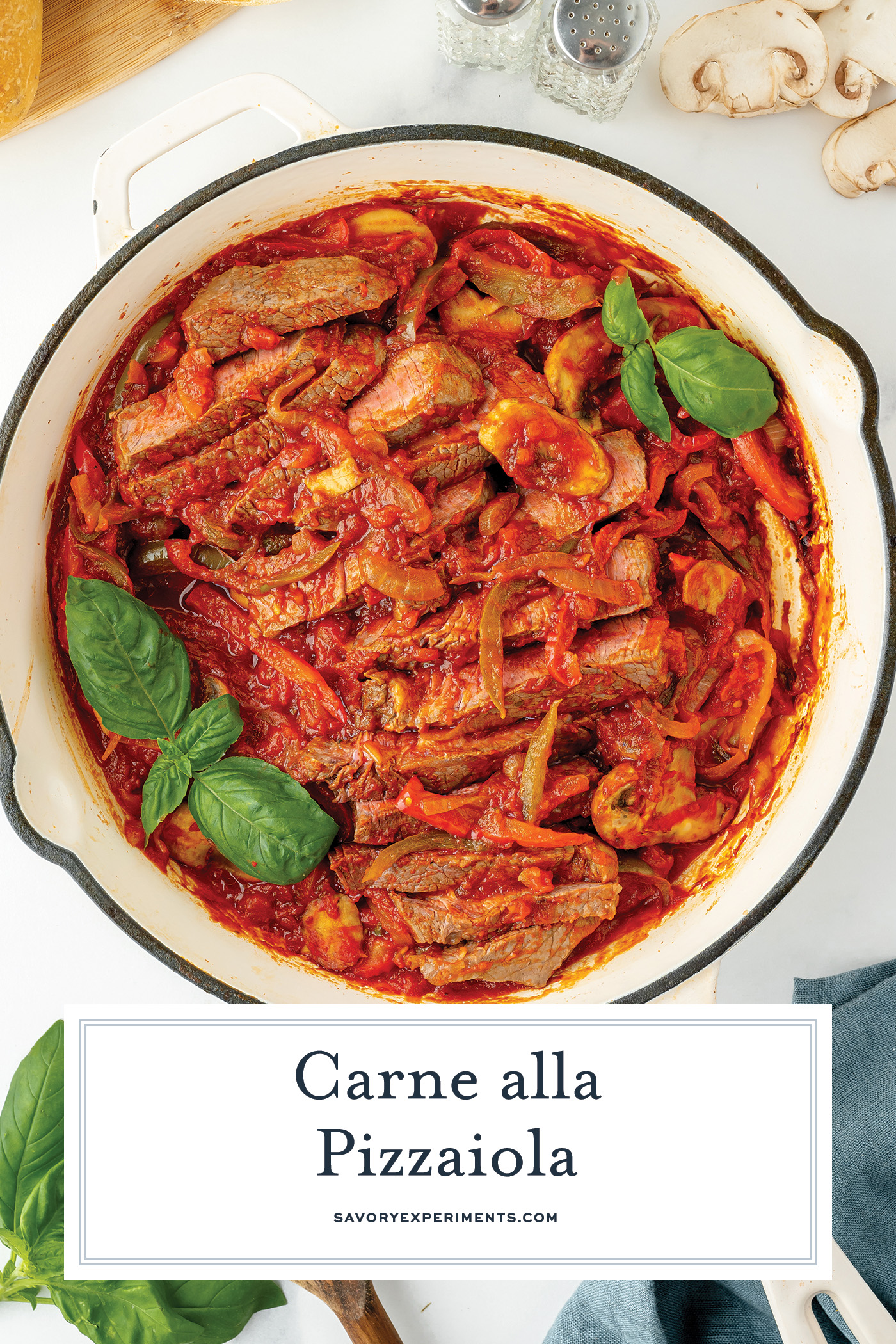 overhead shot of pan of carne alla pizzaiola with text overlay