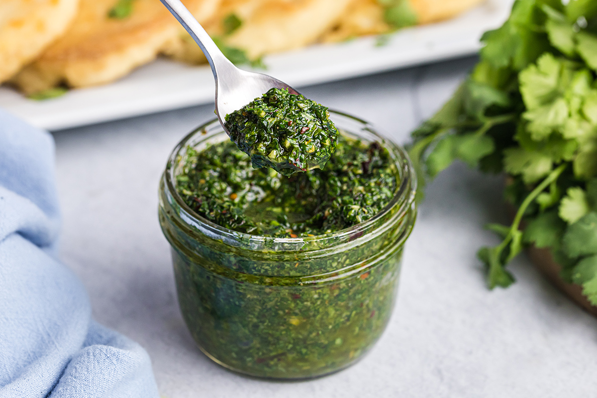 spooning up easy chimichurri sauce