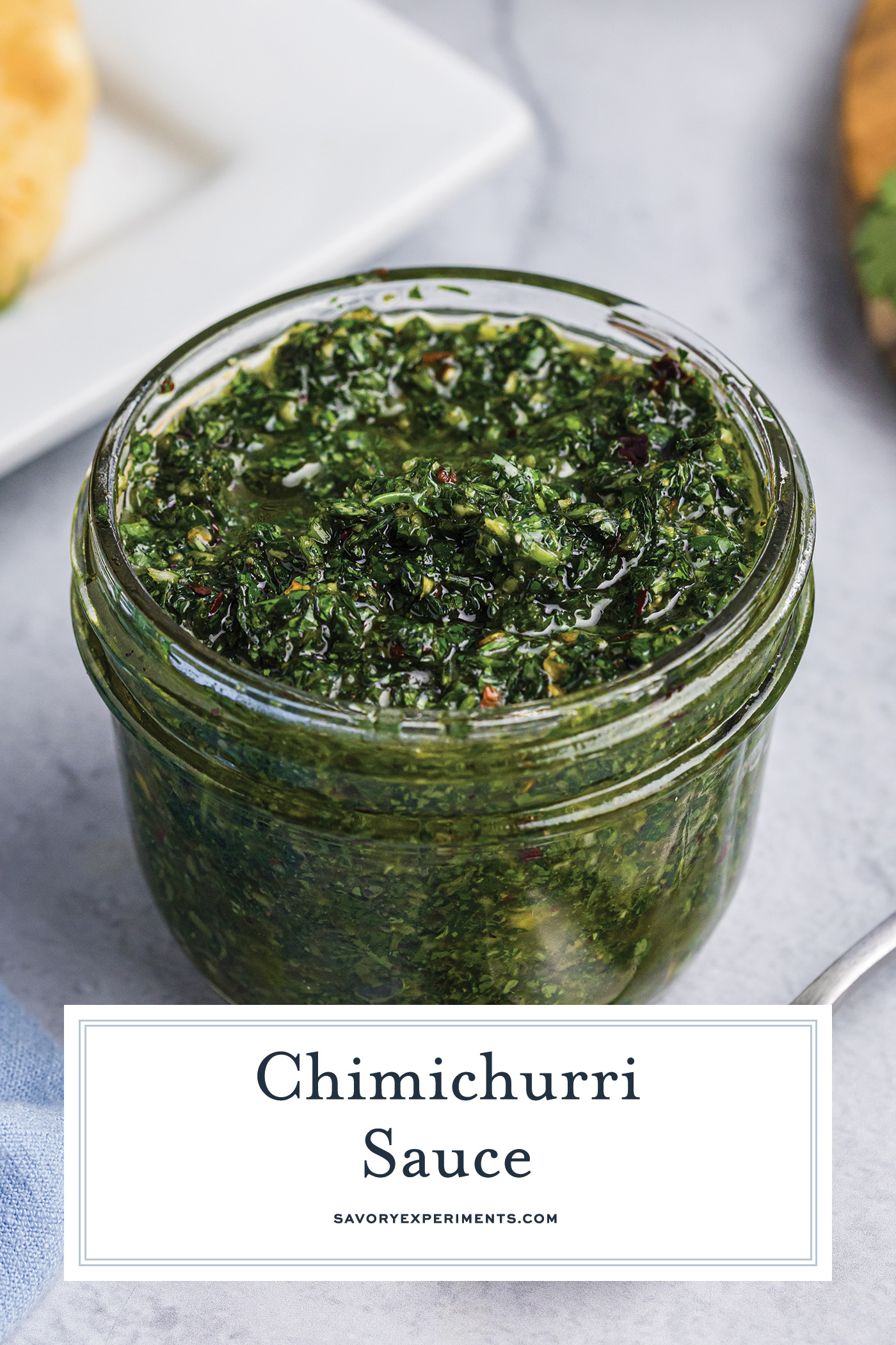 chimichurri sauce in small glass bowl with text overlay