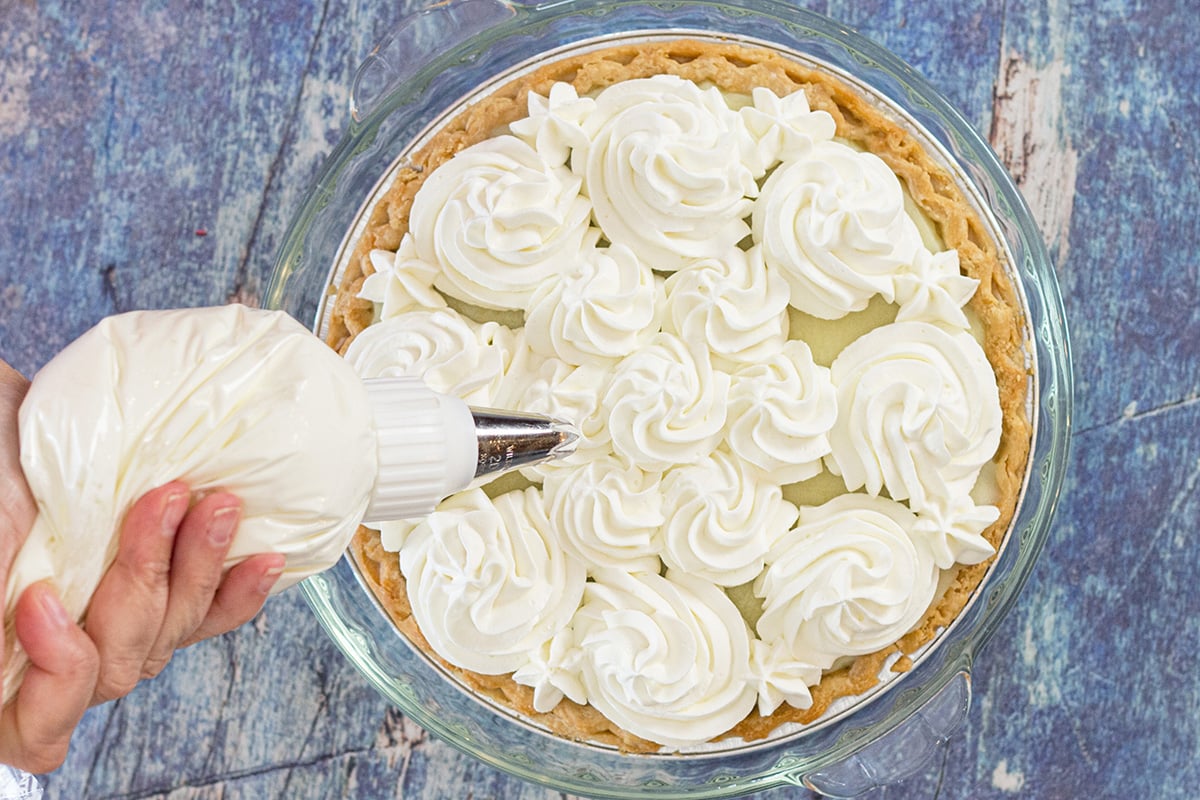 top with whipped cream swirls