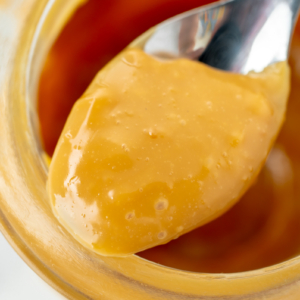 close up shot of spoon of caramel