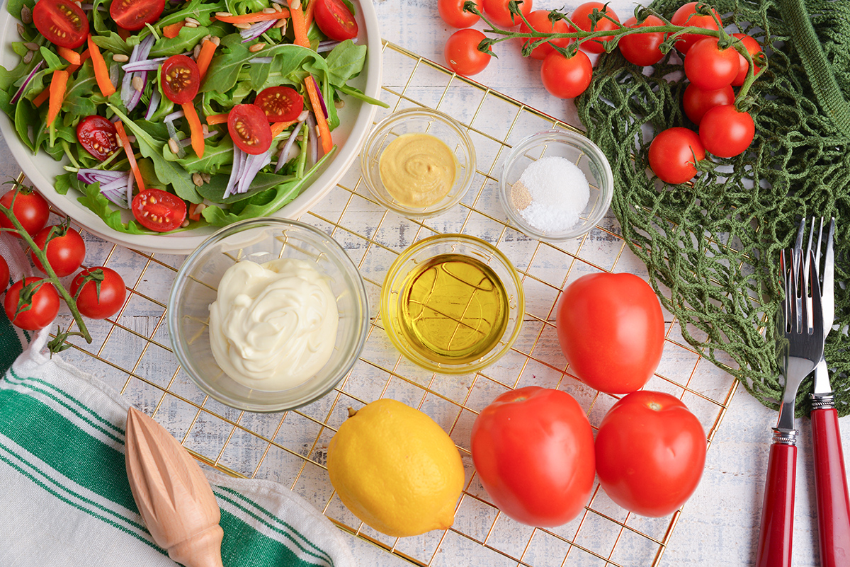 overhead shot of creamy tomato salad dressing ingredients